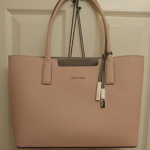 Pink Calvin Klein purse.